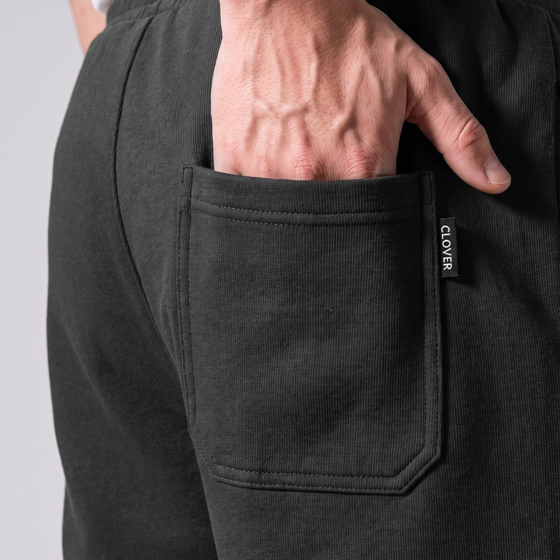 Clover ribbed interlock sweatpants with welt pockets
