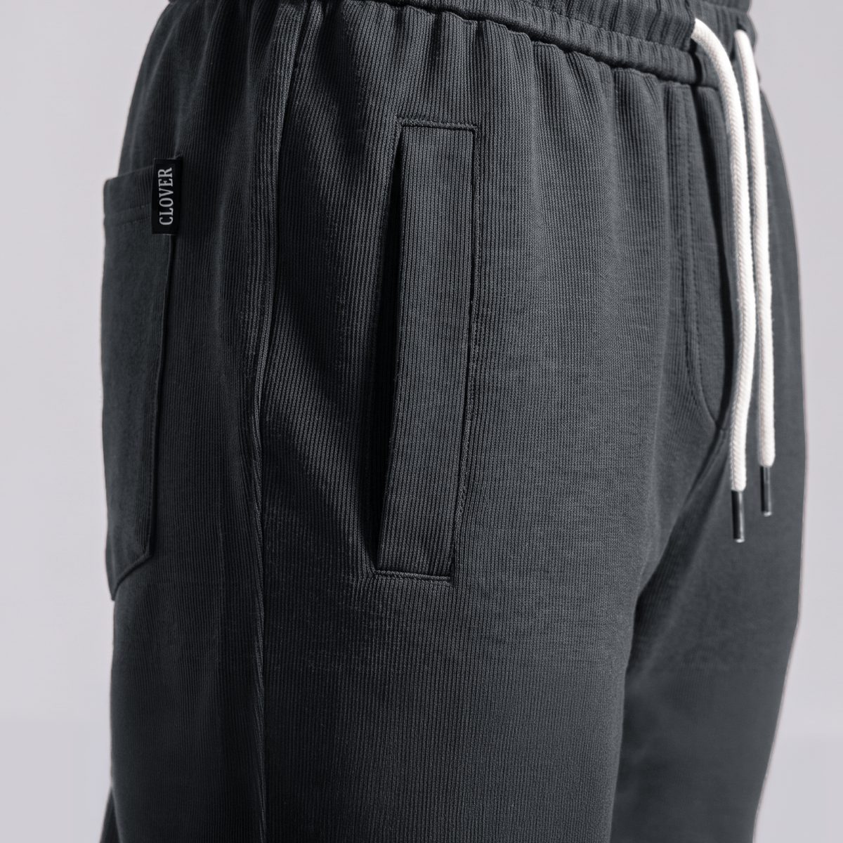 Clover ribbed interlock sweatpants with welt pockets