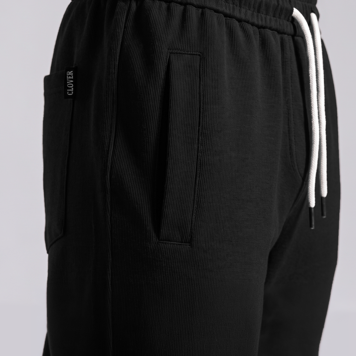 Clover ribbed interlock sweatpants with welt pockets