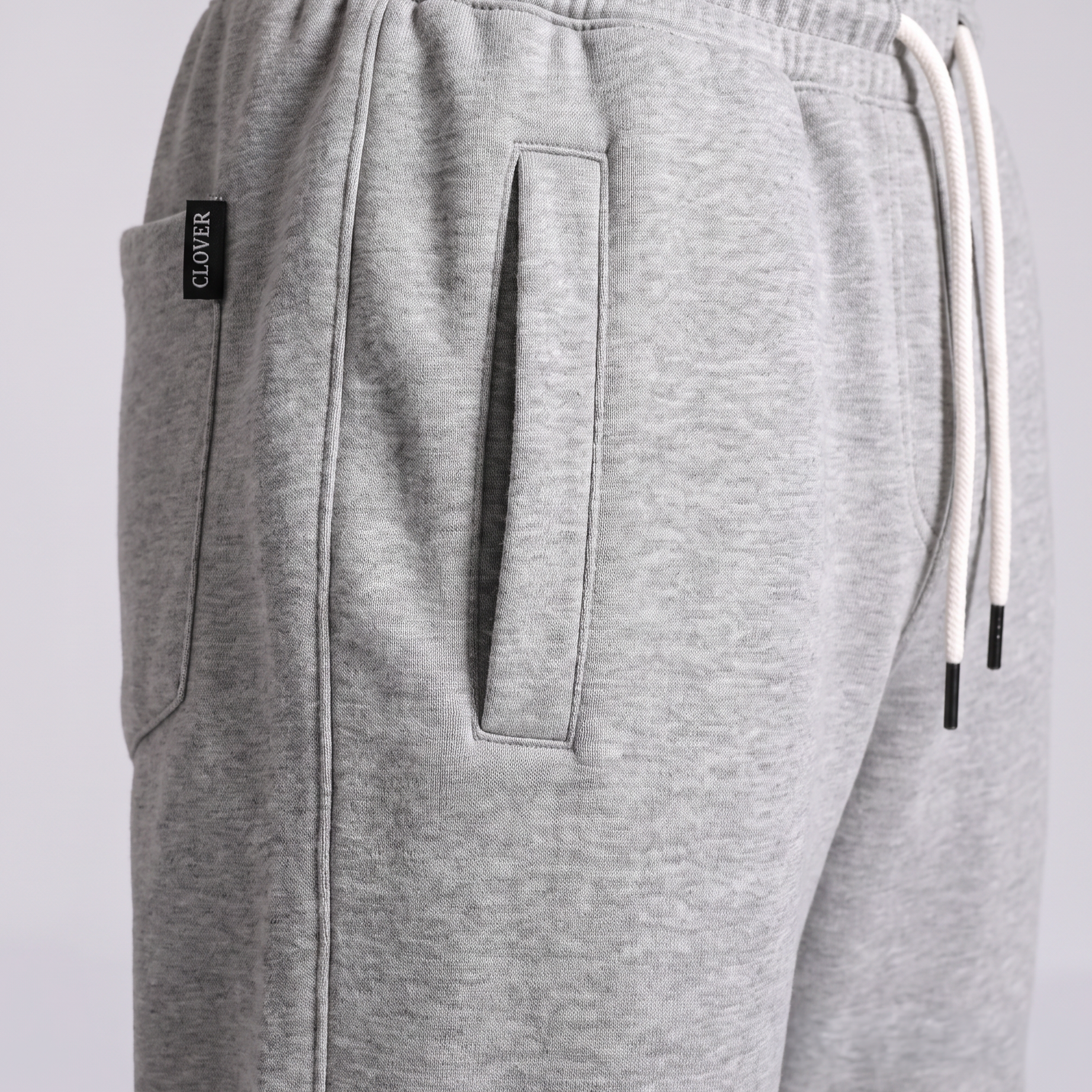 Clover ribbed interlock sweatpants with welt pockets