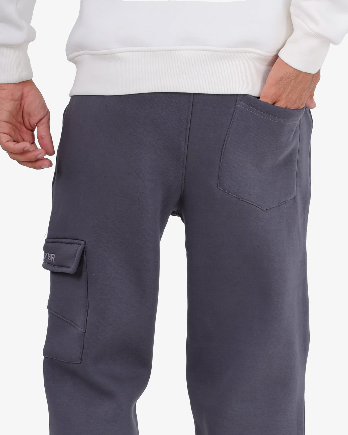 Solid-colored sponge-fabric cargo joggers with a single pocket